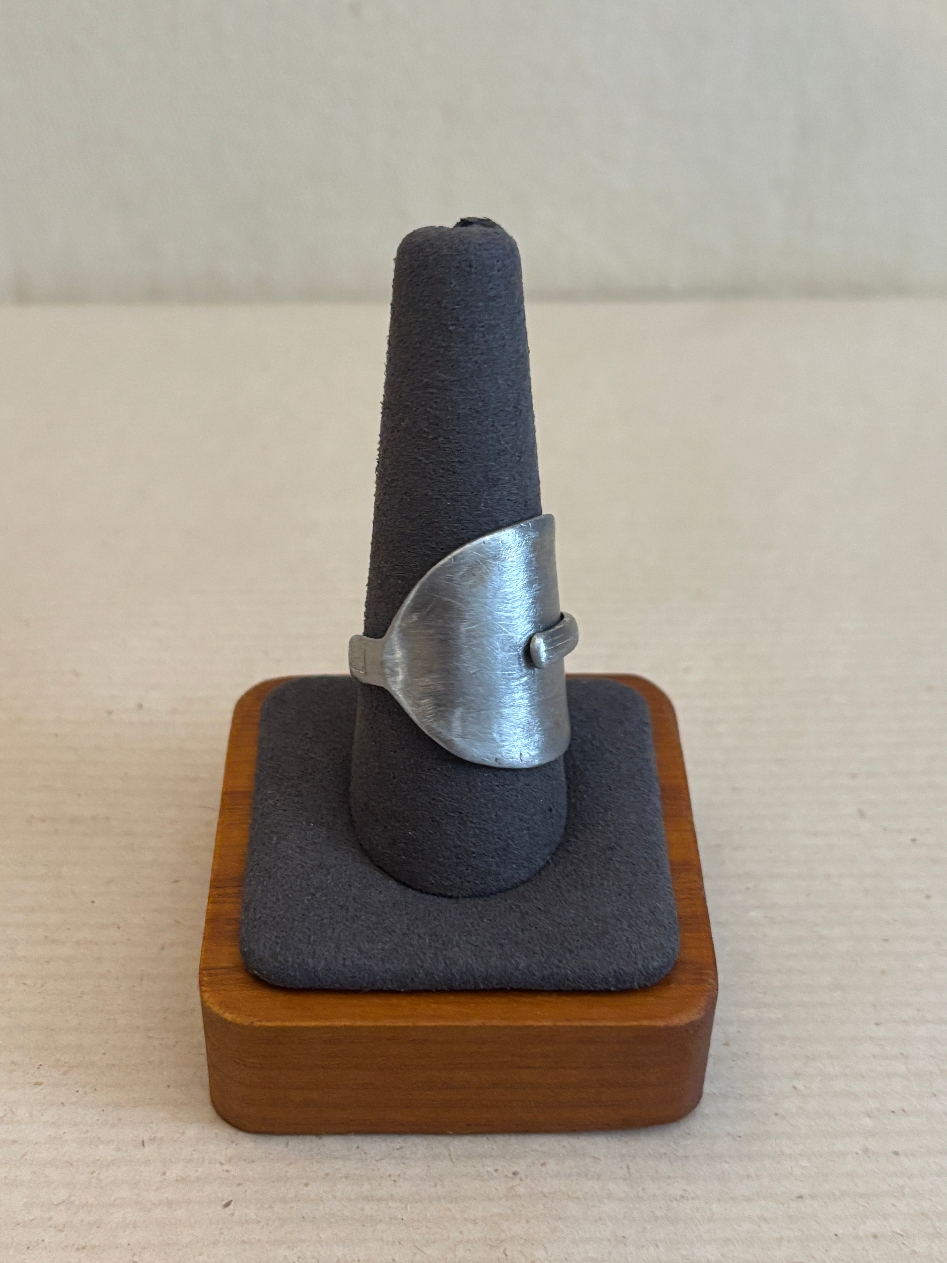 silver spoon on a ring display